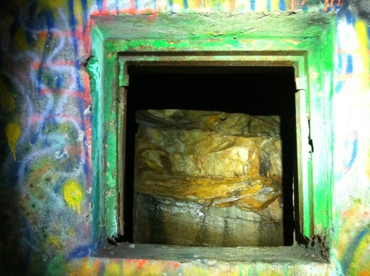 Bedrock through a window in the tunnel.