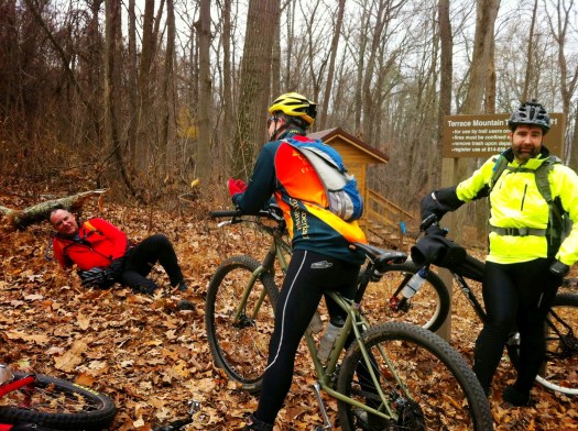 Taking a break at the bottom of Fink Road. The structure in the background is an Adirondack shelter on the TMT.