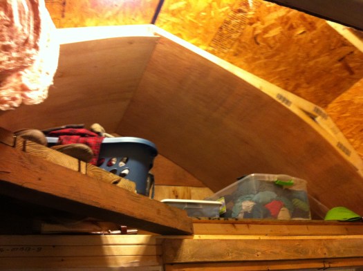 Upstairs---before we built a "closet" area with a metal rod that hung from the ceiling.