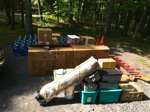 The first pile of stuff is dropped off where the registration tent/HQ will be.