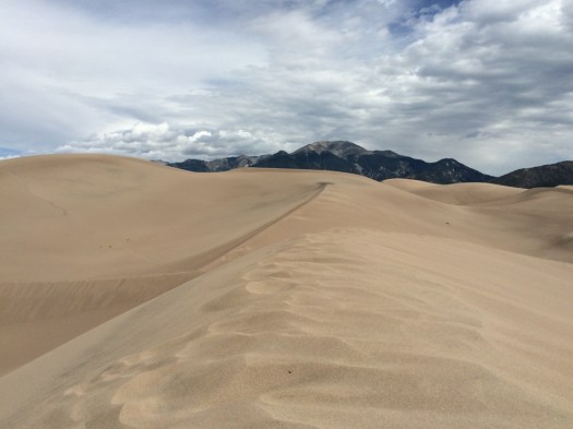 dunes with mountains